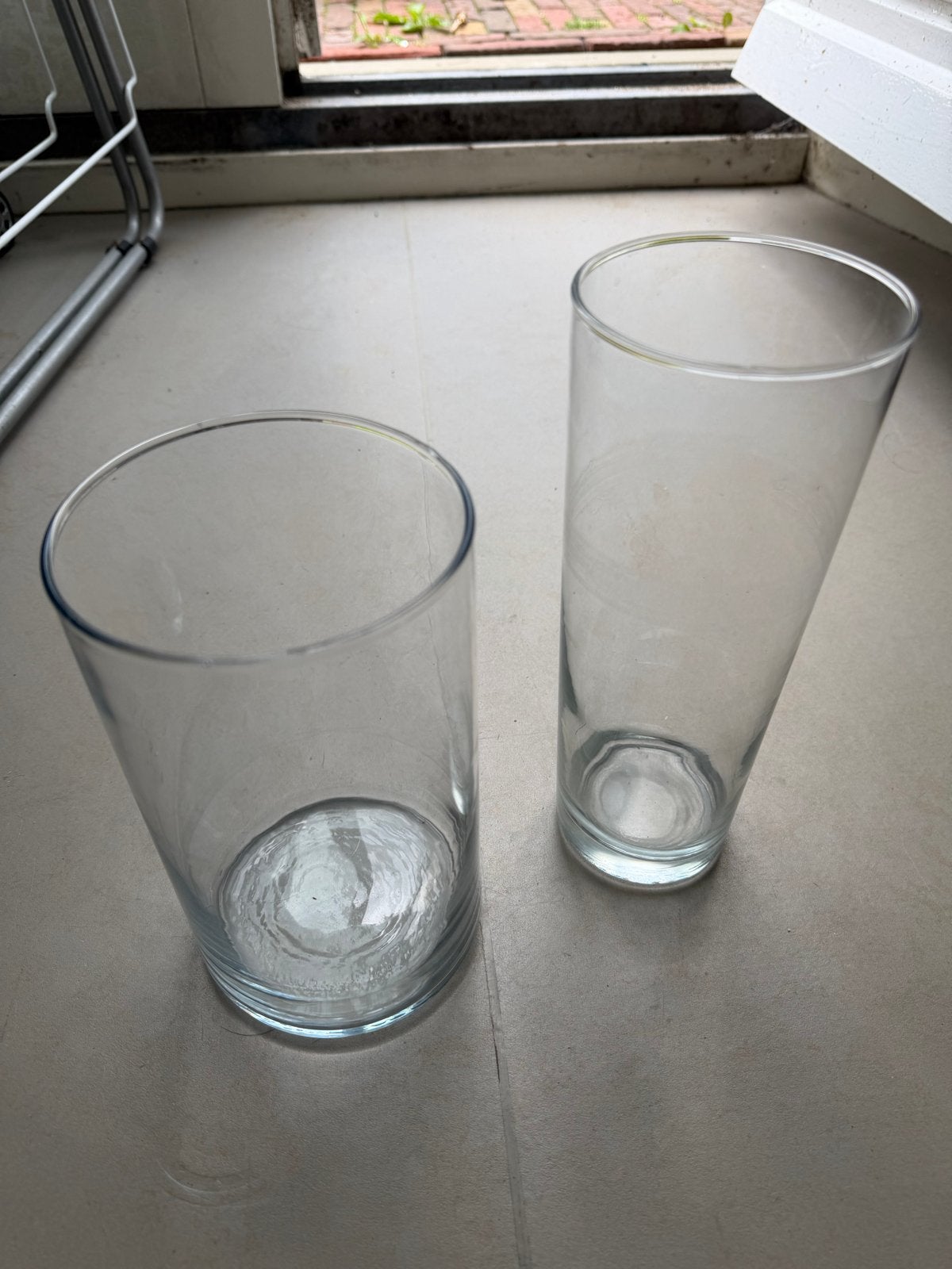 Set van 2 glazen vazen/cilinders - transparant, Ophalen of Verzenden, Gebruikt, Transparant, Glas