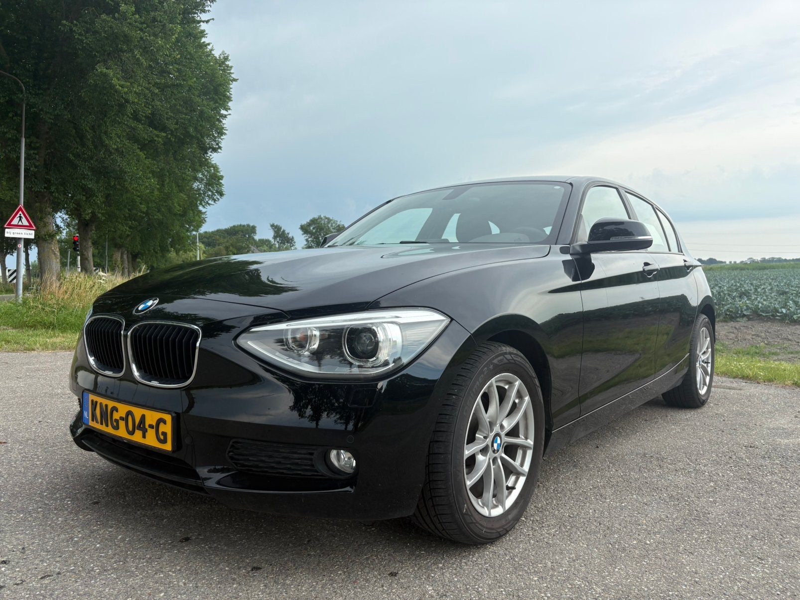 BMW 1-Serie 116I 100KW 5DR Aut8 2013 Zwart, Auto's, 4 cilinders, Zwart, 650 kg, Hatchback