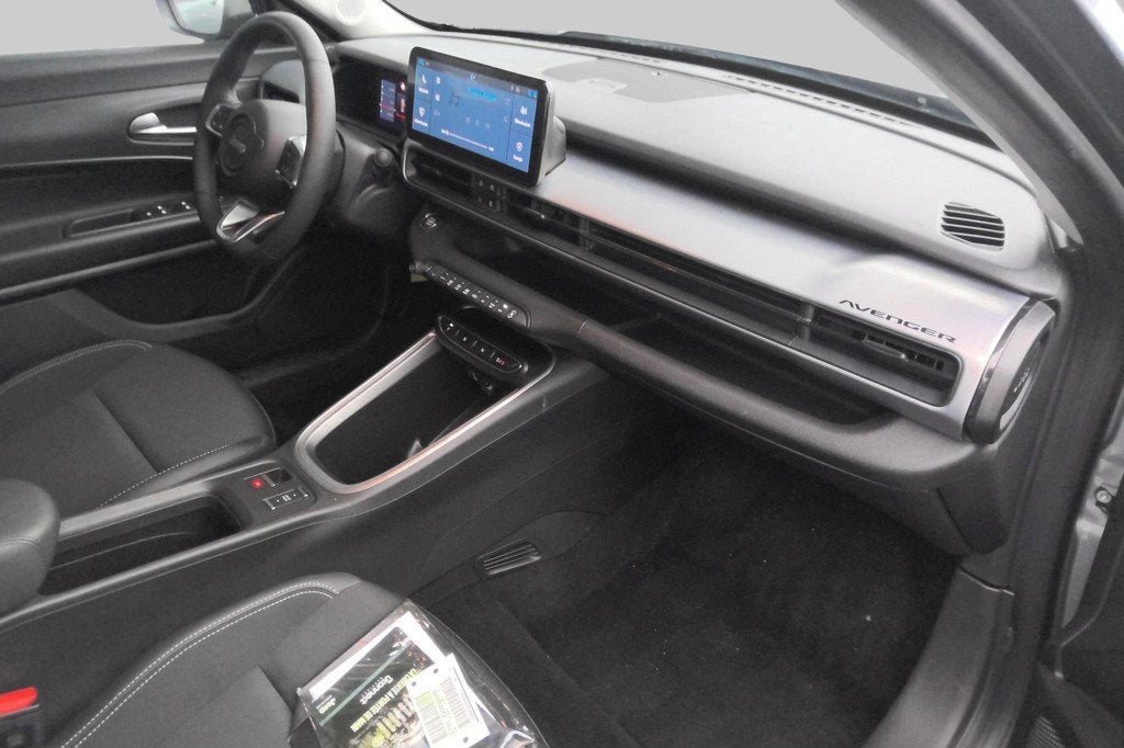 Jeep Avenger Altitude 54 kWh | Wordt verwacht | Adaptive cru, Stof, Gebruikt, Zwart, Met garantie (alle)