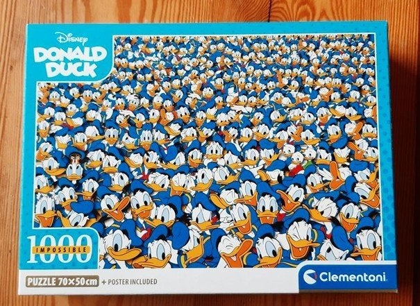 Disney puzzel, Donald Duck, Impossible, Ophalen of Verzenden, 500 t/m 1500 stukjes, Zo goed als nieuw, Legpuzzel