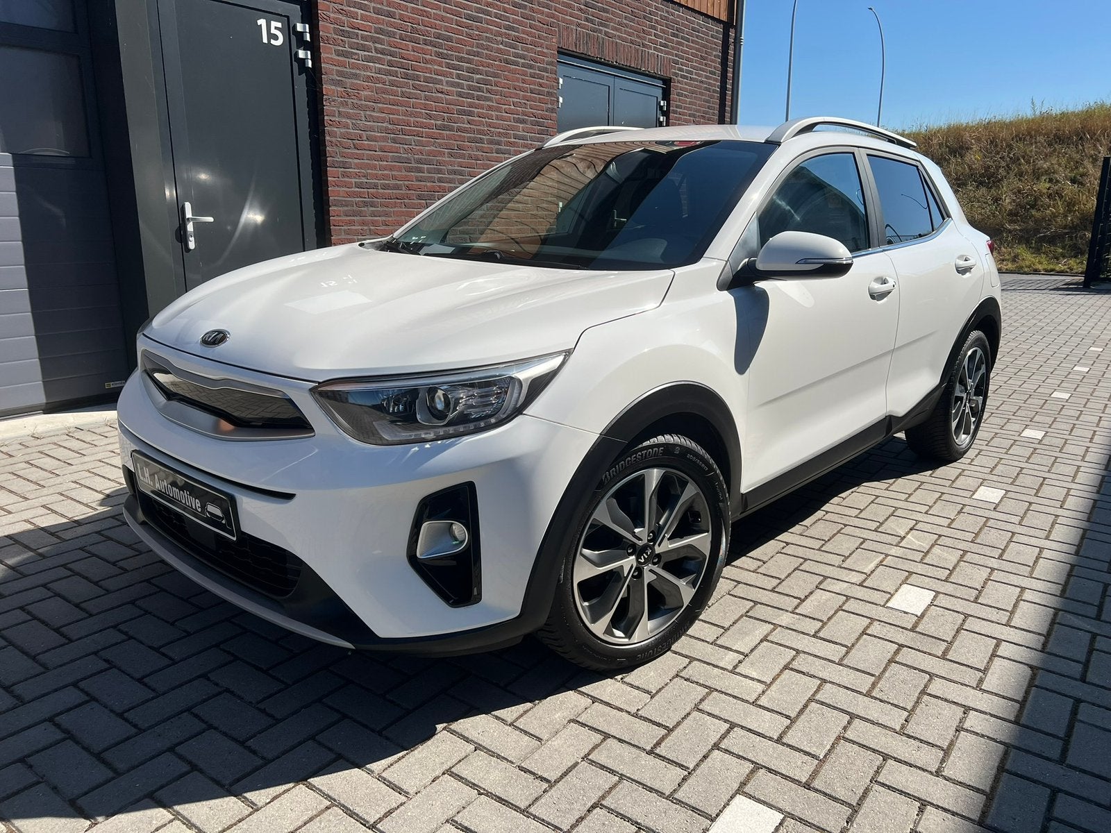 Kia Stonic 1.0 T-GDI Automaat | Dynamic Line | Navi | Leder, Auto's, Wit, Leder, Bedrijf, 3 cilinders