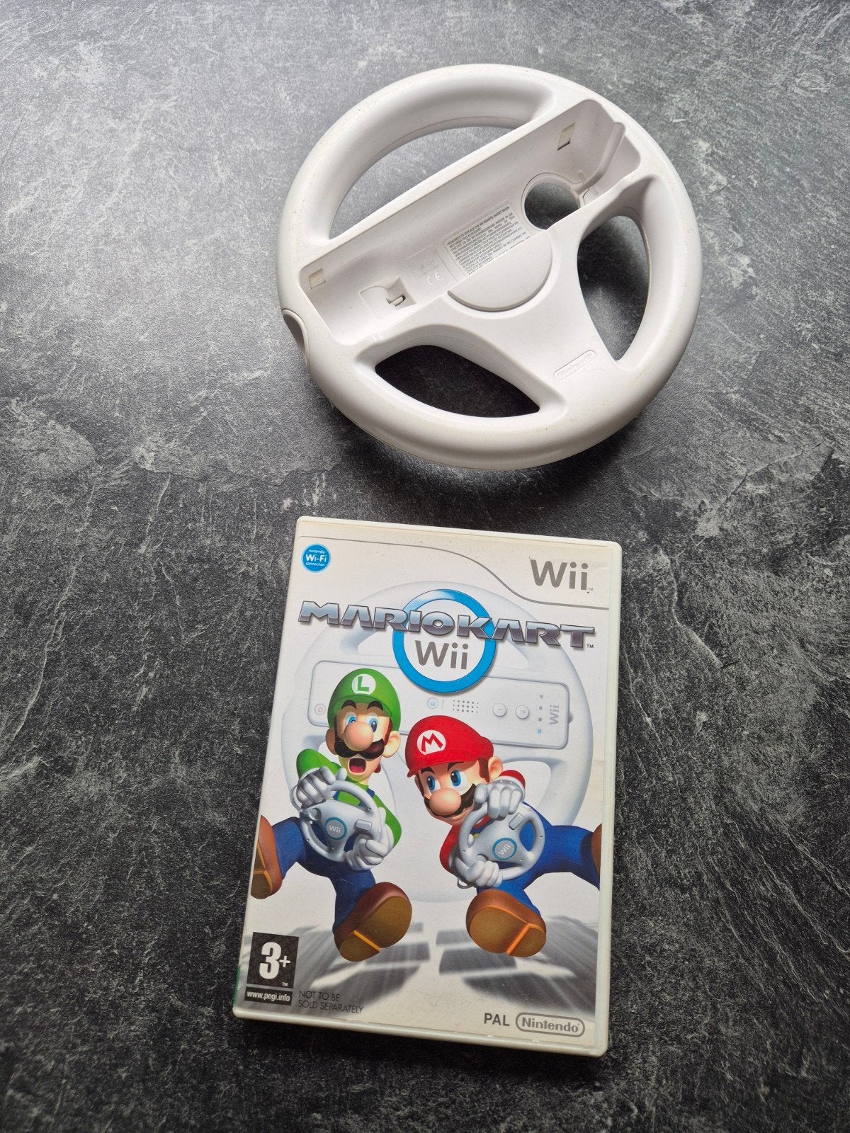 Mario Kart Wii met stuur - Klassiek raceplezier!, Spelcomputers en Games, Games | Nintendo Wii, Gebruikt, Racen en Vliegen, Eén computer