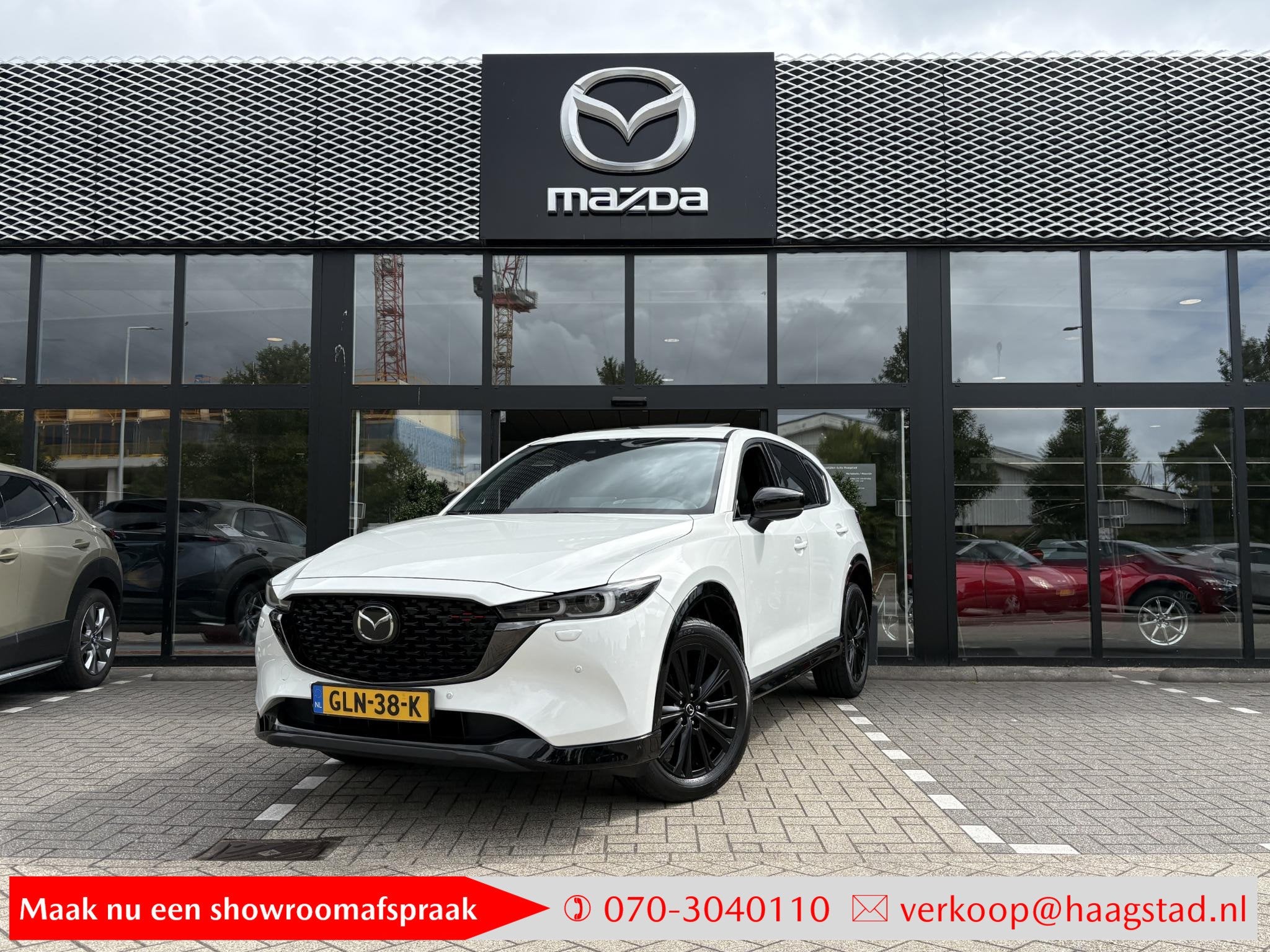 Mazda CX-5 2.0 e-SkyActiv-G M Hybrid 165 Homura Dealer onder, Auto's, Gebruikt, 4 cilinders, 2000 kg, Wit