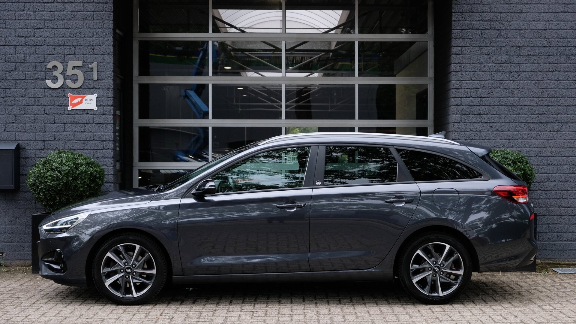 Hyundai I30 Wagon 1.0 T-GDi MHEV Edition 30+ Carplay | Camer, Auto's, Dealer onderhouden, Stof, Gebruikt, Zwart