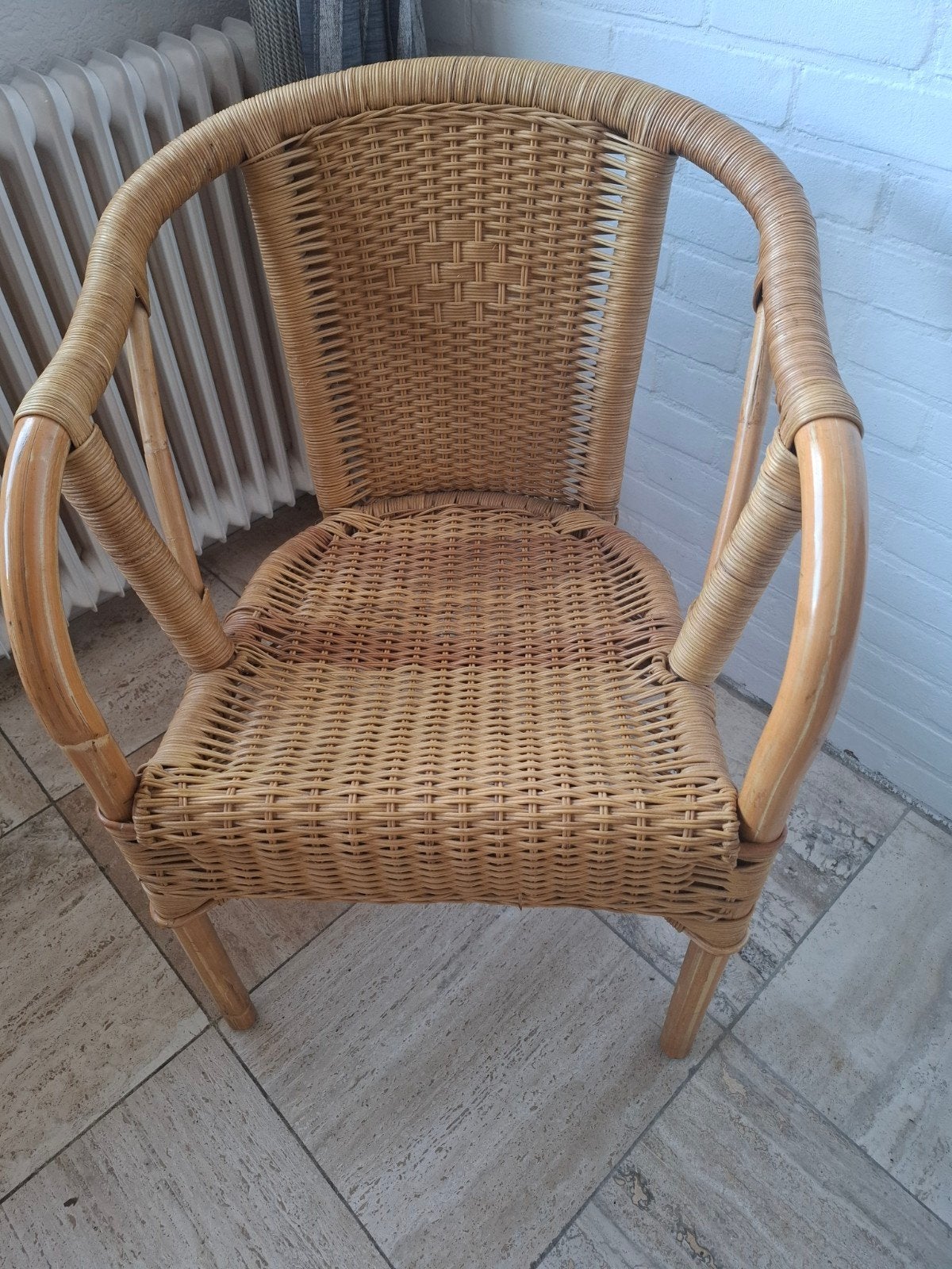 Rotan stoel met armleuningen, Ophalen