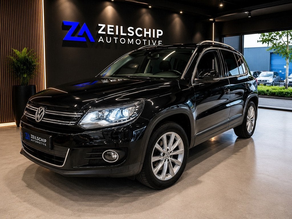 Volkswagen Tiguan 1.4 TSI Sport & Style BlueMotion Navi|Xeno, Voorwielaandrijving, Euro 5, 15 km/l, Gebruikt