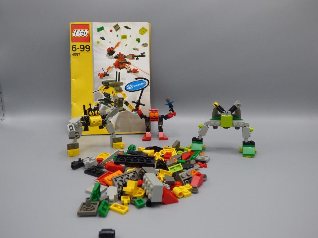 lego 4097 Minirobots met boekje, Gebruikt, Lego, Compleet, Ophalen of Verzenden