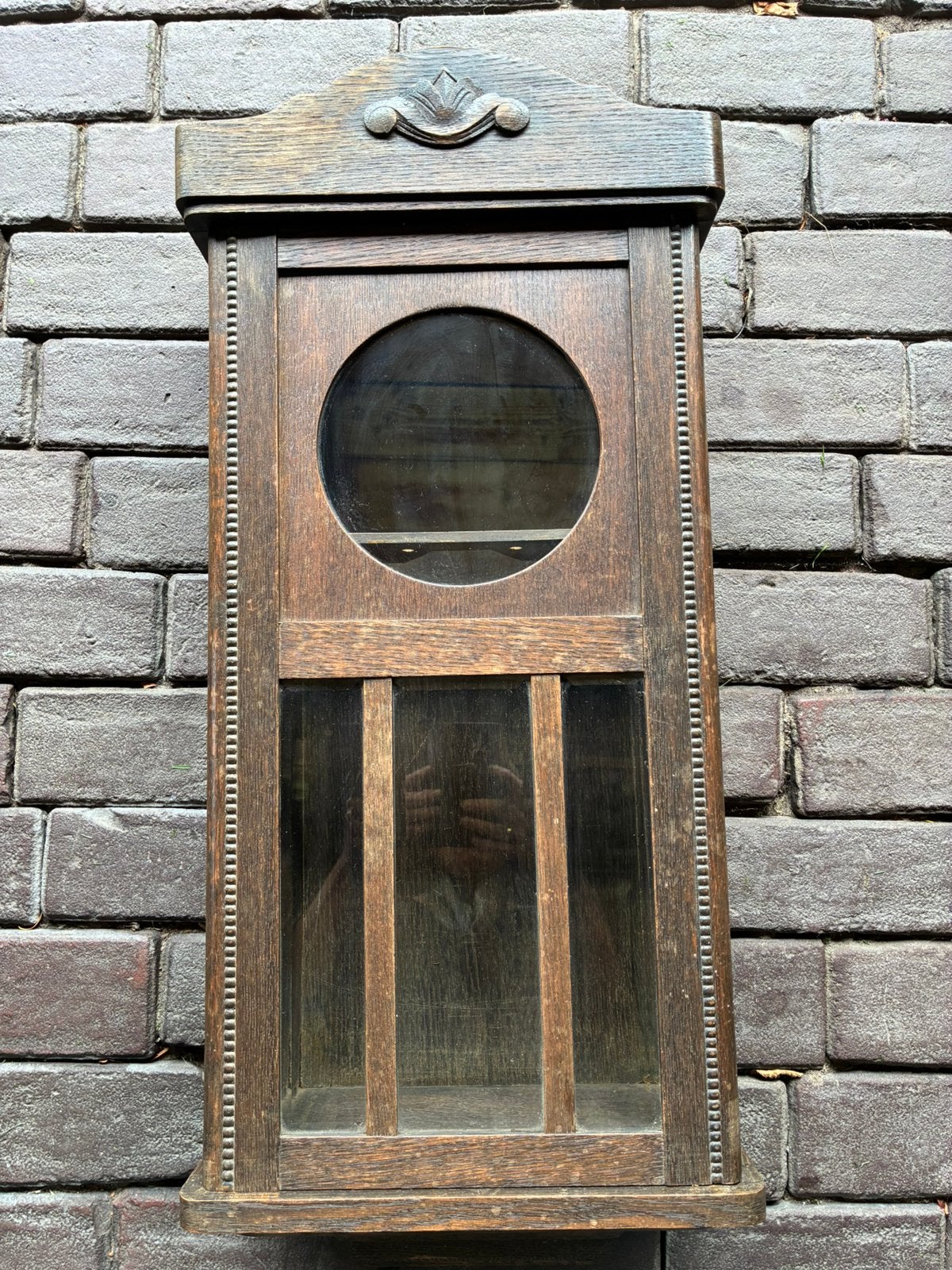 Oud wandkastje van klok, Ophalen