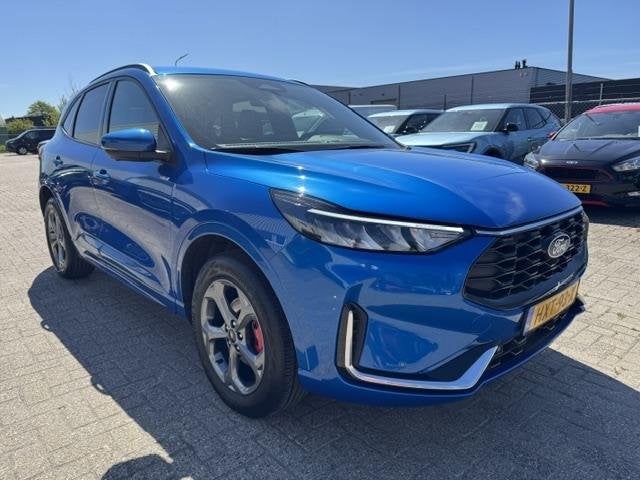 Ford Kuga 2.5 PHEV ST-Line X 243pk | Trekhaak | Winterpack |, Auto's, Ford, 14 kWh, Gebruikt, Blauw, Leder en Stof