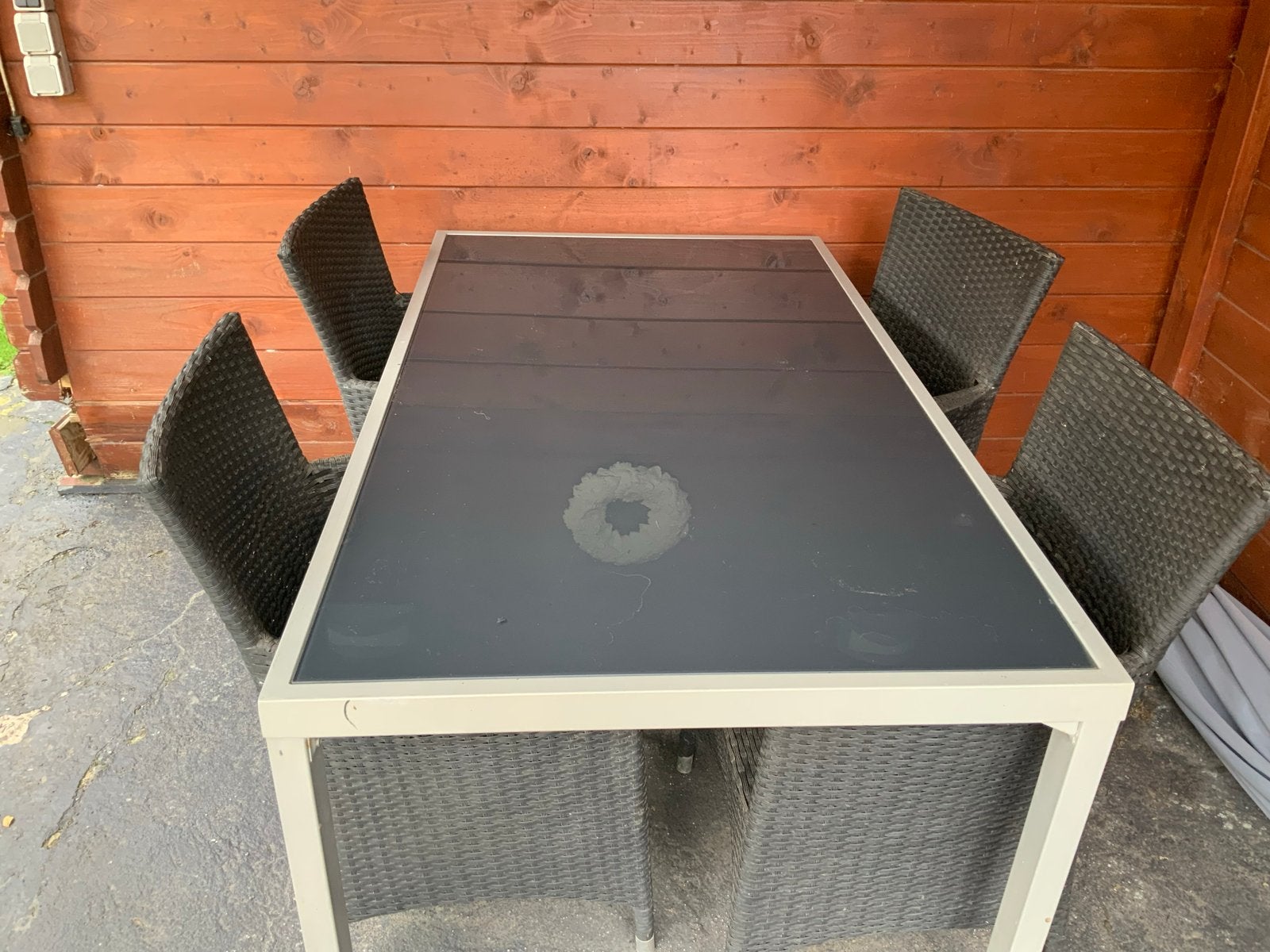 Tuinset met 4 stoelen en glazen tafel