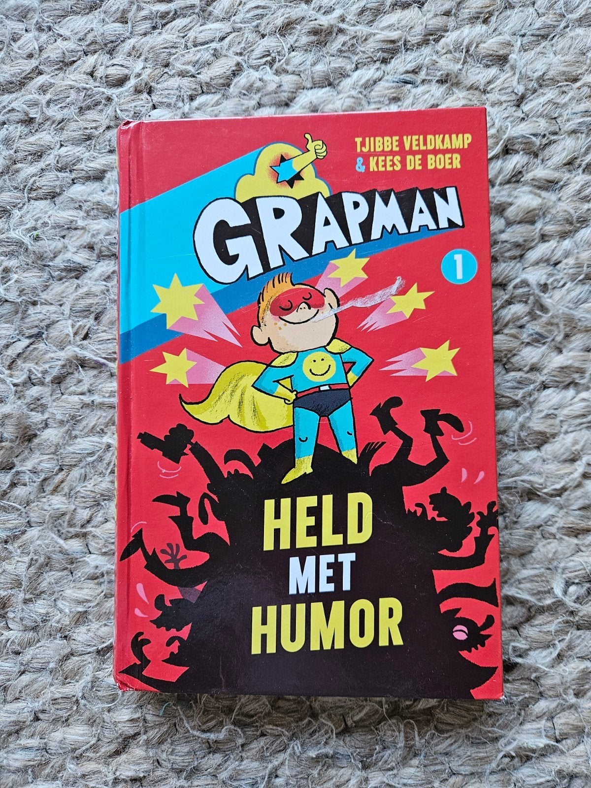Grapman 1: Held met Humor - Tjibbe Veldkamp & Kees de Boer, Ophalen of Verzenden, Zo goed als nieuw, Tjibbe Veldkamp & Kees de Boer