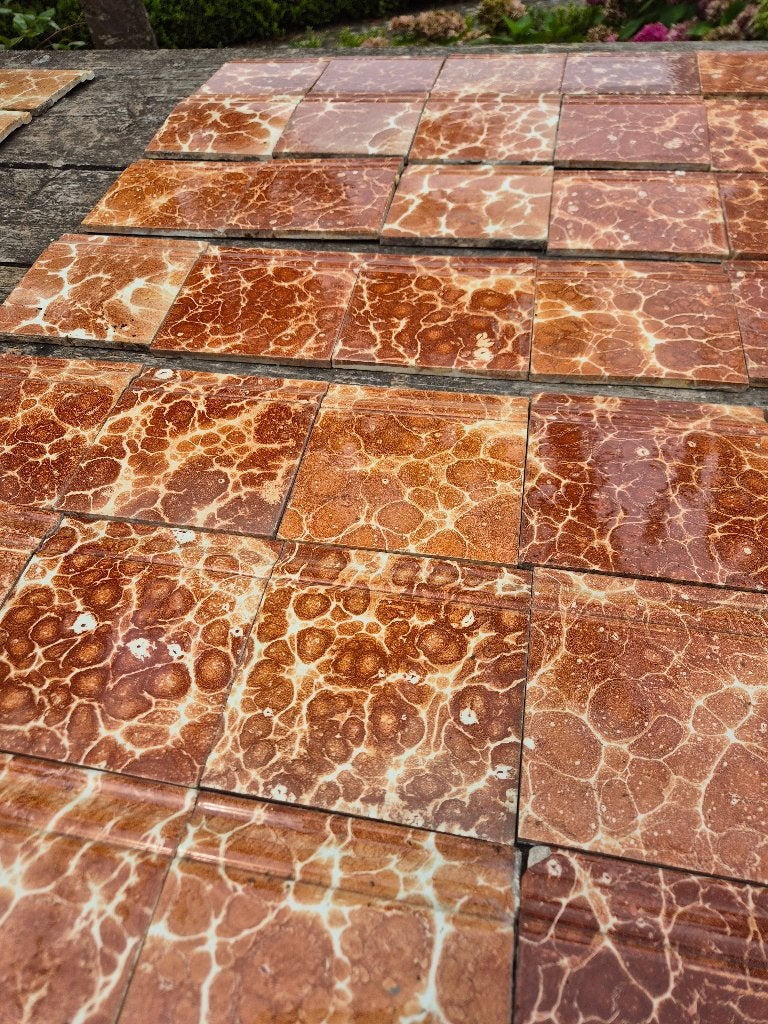 80 antieke plinttegels roodbruin gemarmerd, Ophalen
