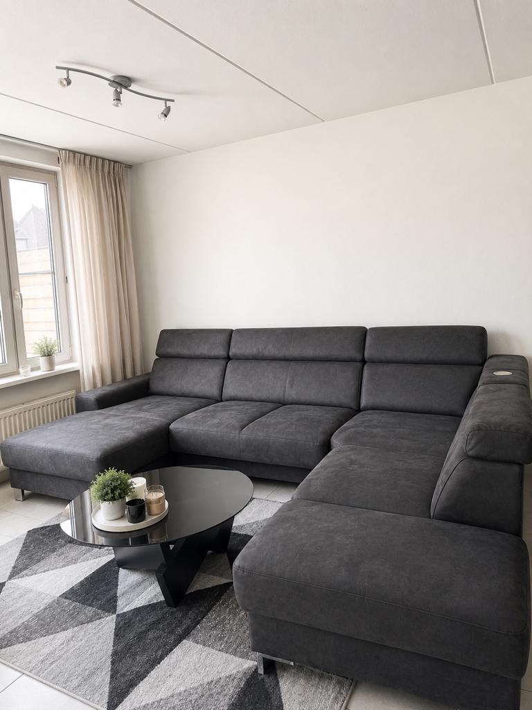 Ruime donkergrijze hoekbank - Modern en comfortabel, Huis en Inrichting, Banken | Bankstellen, Gebruikt, Hoekbank, Ophalen of Verzenden
