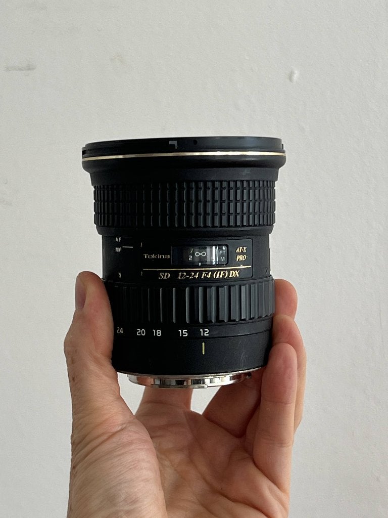 Tokina 12-24mm F4 (voor onderdelen), Audio, Tv en Foto, Ophalen of Verzenden, Groothoeklens, Zoom