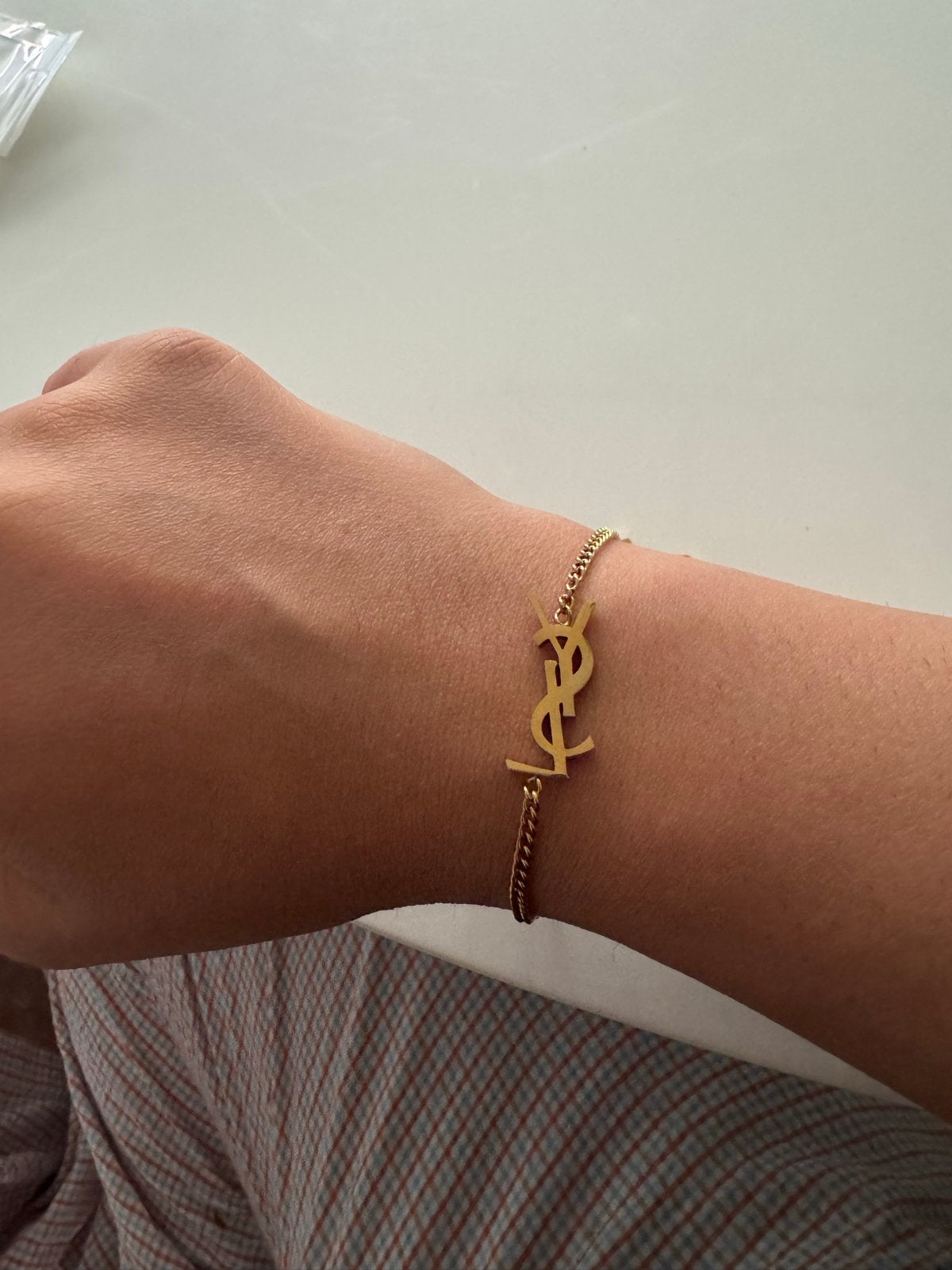 Saint laurent gouden armband, Ophalen of Verzenden, Zo goed als nieuw, Goud, Overige materialen