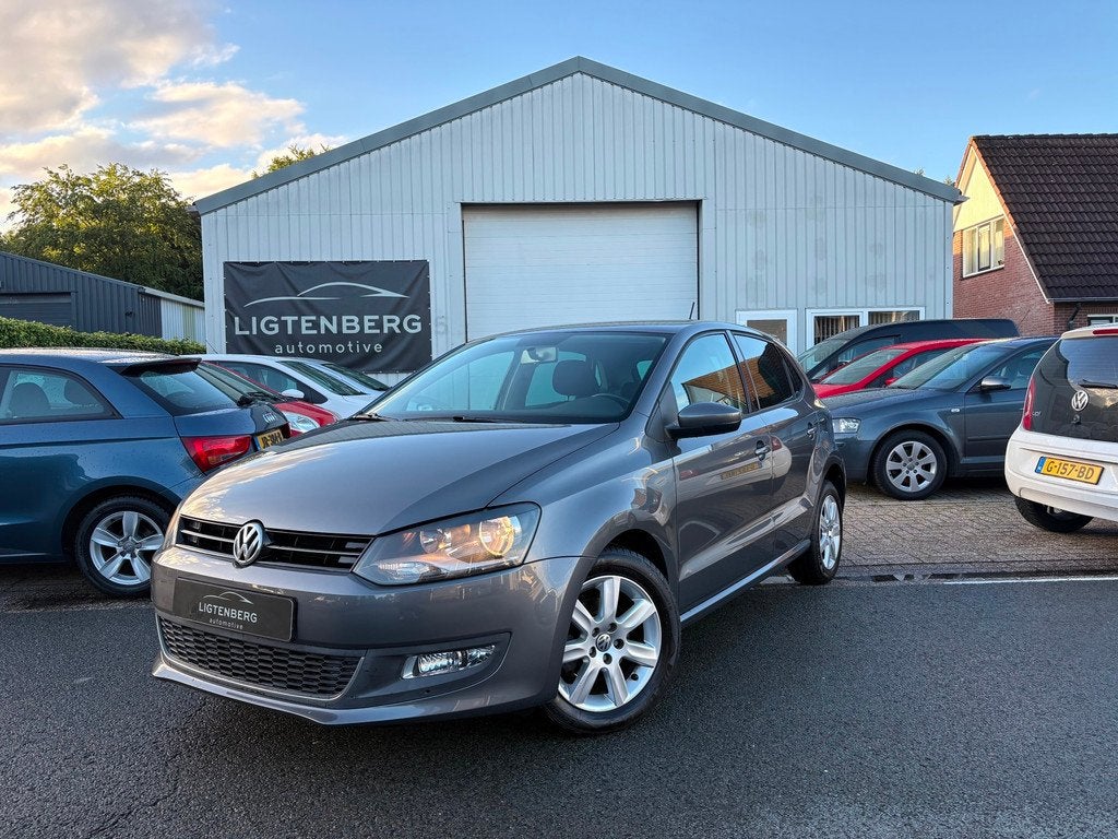 Volkswagen Polo 1.2 TSI Highline AUTOMAAT/CRUISE/CLIMA/NAP, Auto's, Volkswagen, Euro 5, 4 cilinders, Origineel Nederlands, 19 km/l