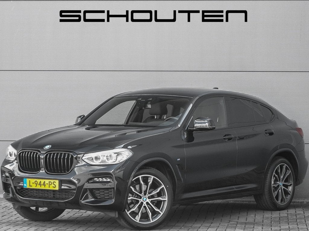 BMW X4 xDrive20i M-Sport Camera Trekhaak 20" (bj 2021), 15 km/l, 4 cilinders, Leder en Stof, Zwart
