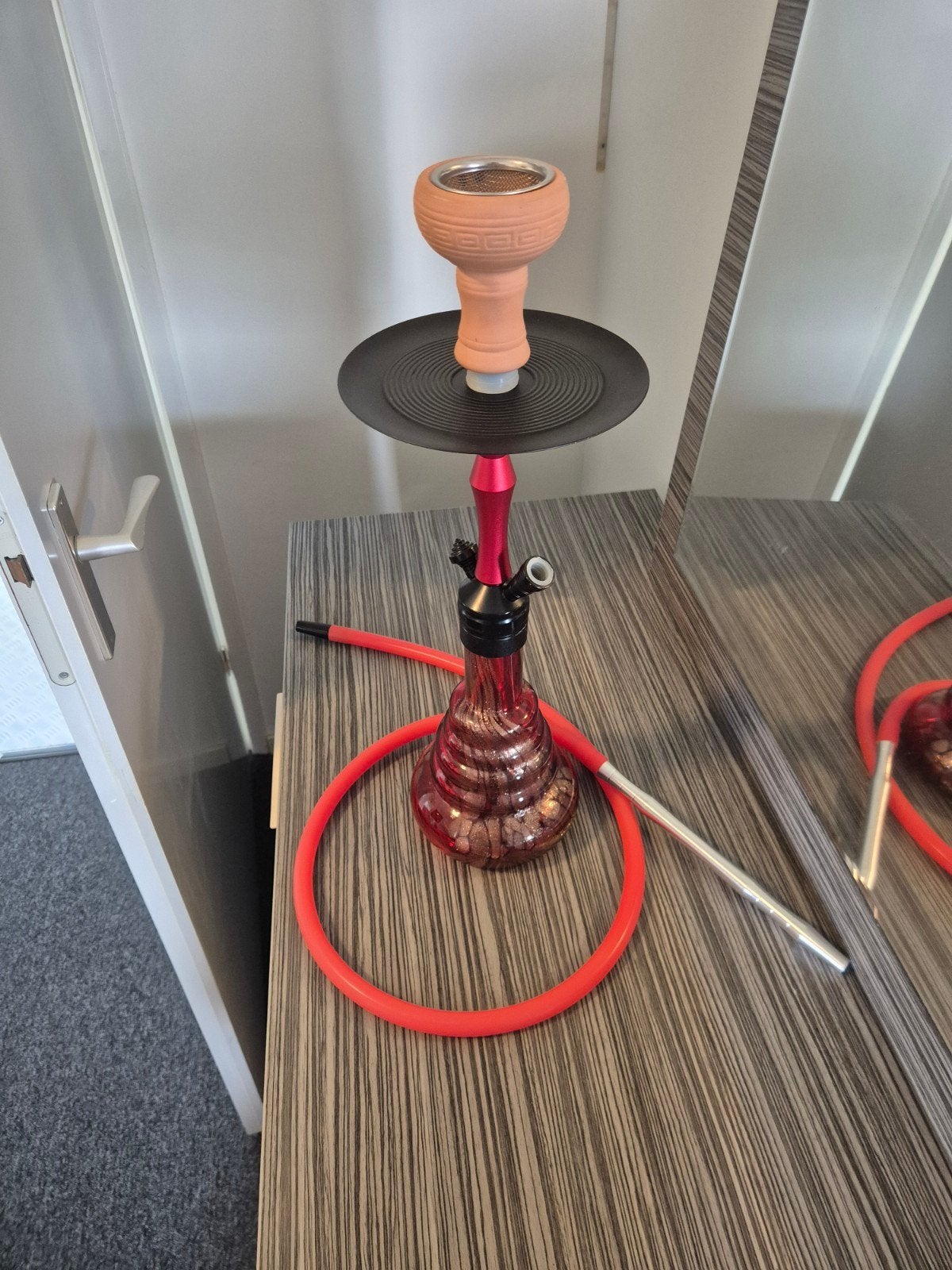 Shisha vazen, Ophalen