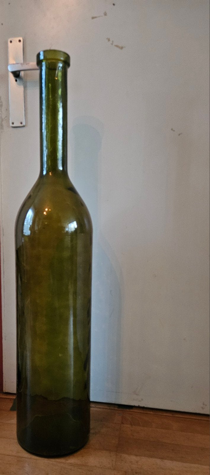groene fles (vaas), Ophalen