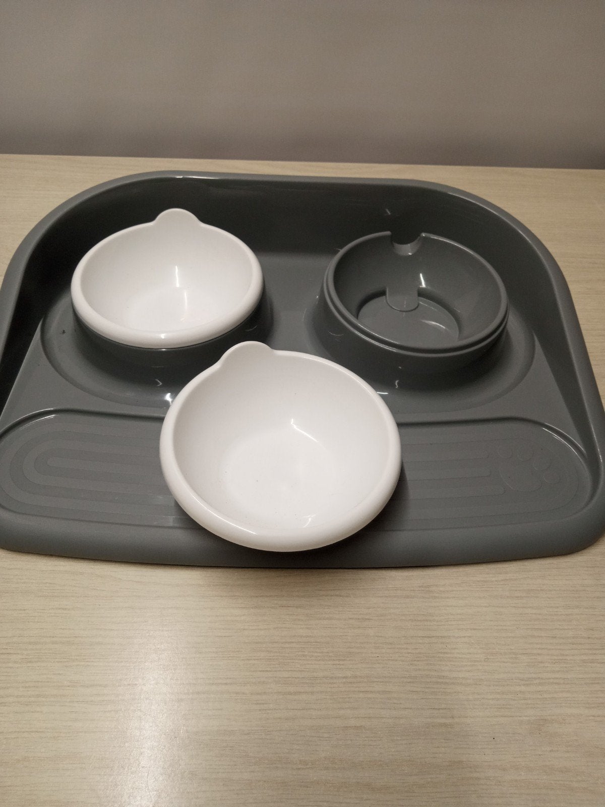 Tray met voerbakjes, Ophalen