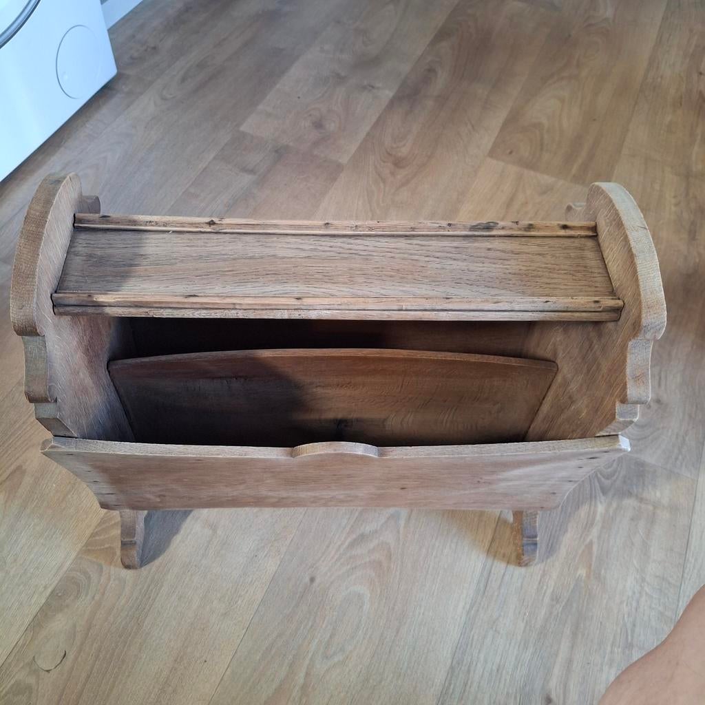 Opa's kranten bak., Ophalen