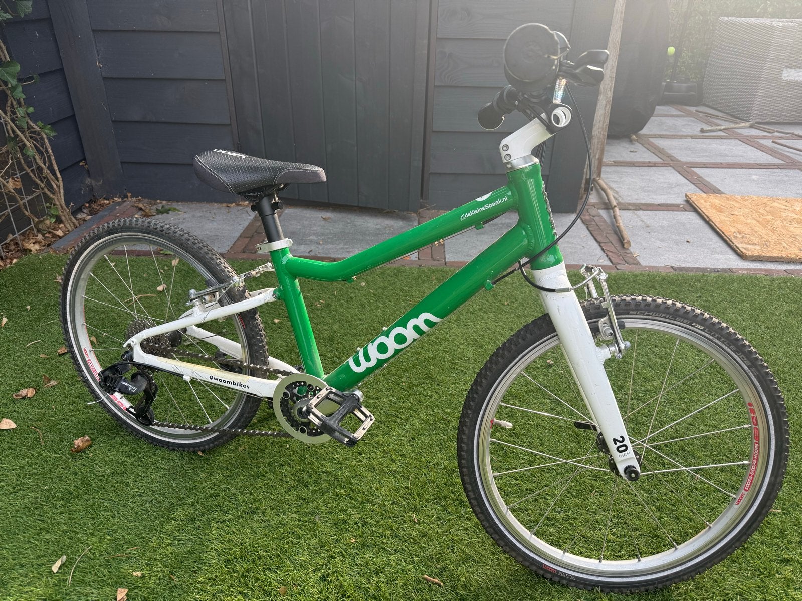 Woom 4 kinderfiets groen - Goed onderhouden, Ophalen, Gebruikt, Velgrem, 20 inch of meer