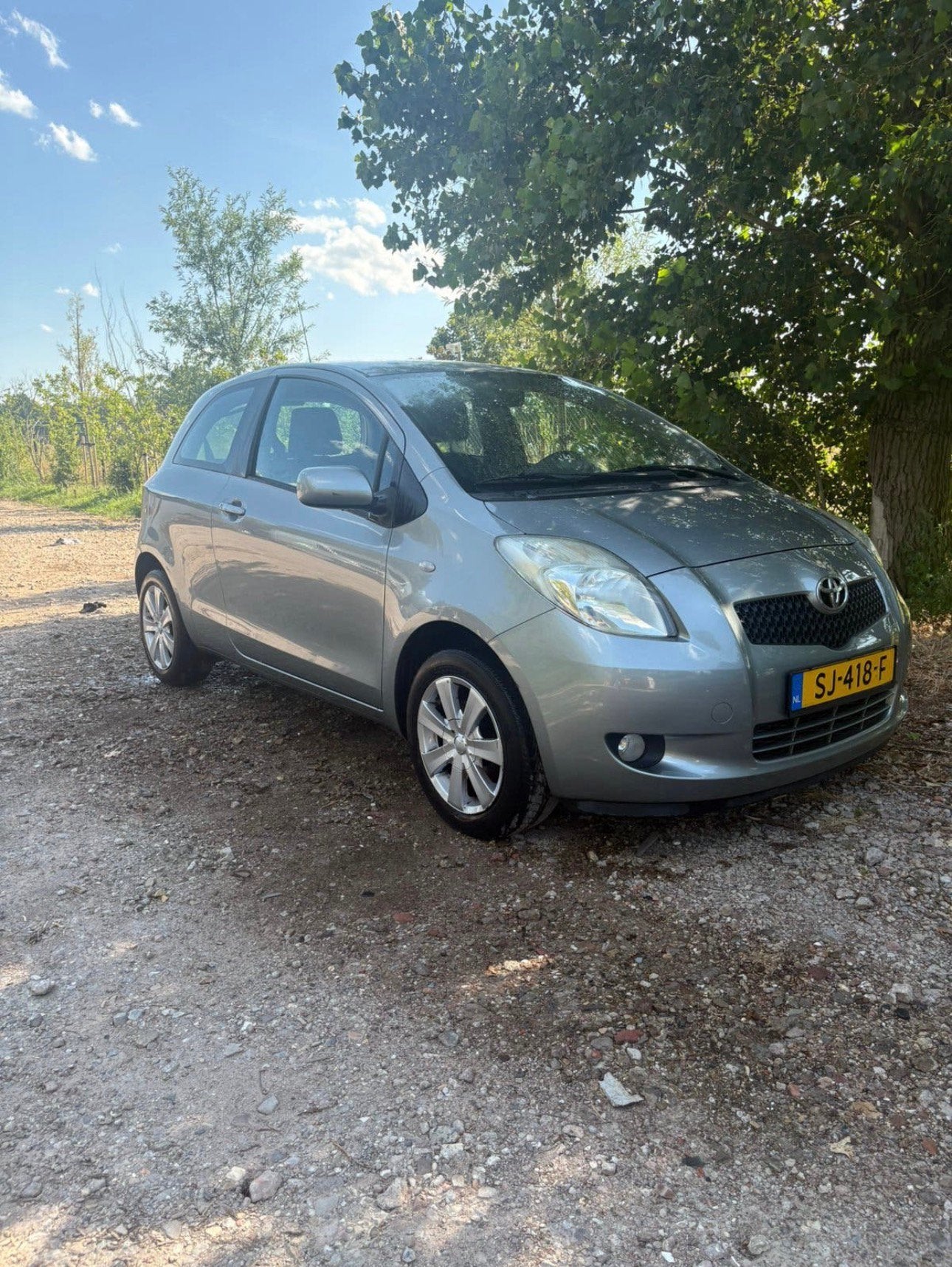 Toyota Yaris 1.3 16V Vvt-i 3DR Luna 2007 Grijs, Voorwielaandrijving, Stof, 40 €/maand, Zwart