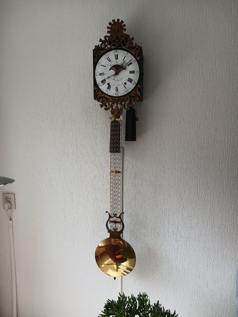 Klok Franse Comtoise met lyra slinger, Ophalen