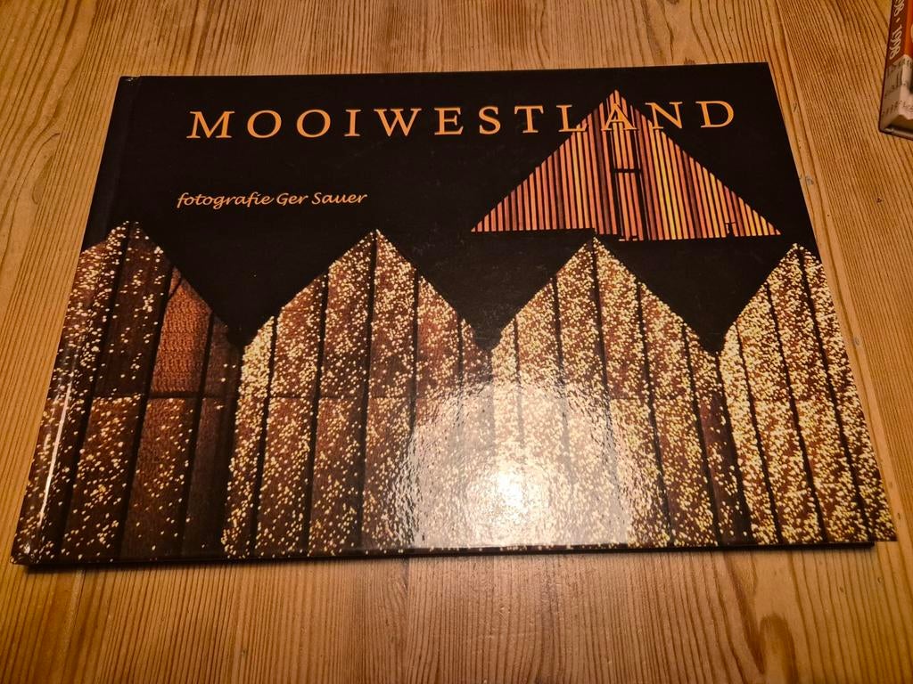 Mooiwestland - Fotoboek door Ger Sauer, Ophalen of Verzenden, Zo goed als nieuw, Ger Sauer