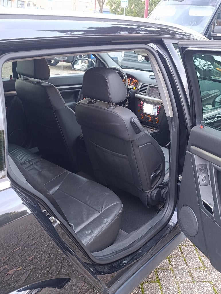 Opel Vectra 1.8 16V St.wgn 2009 Zwart, Auto's, 4 cilinders, 1796 cc, Origineel Nederlands, Handgeschakeld