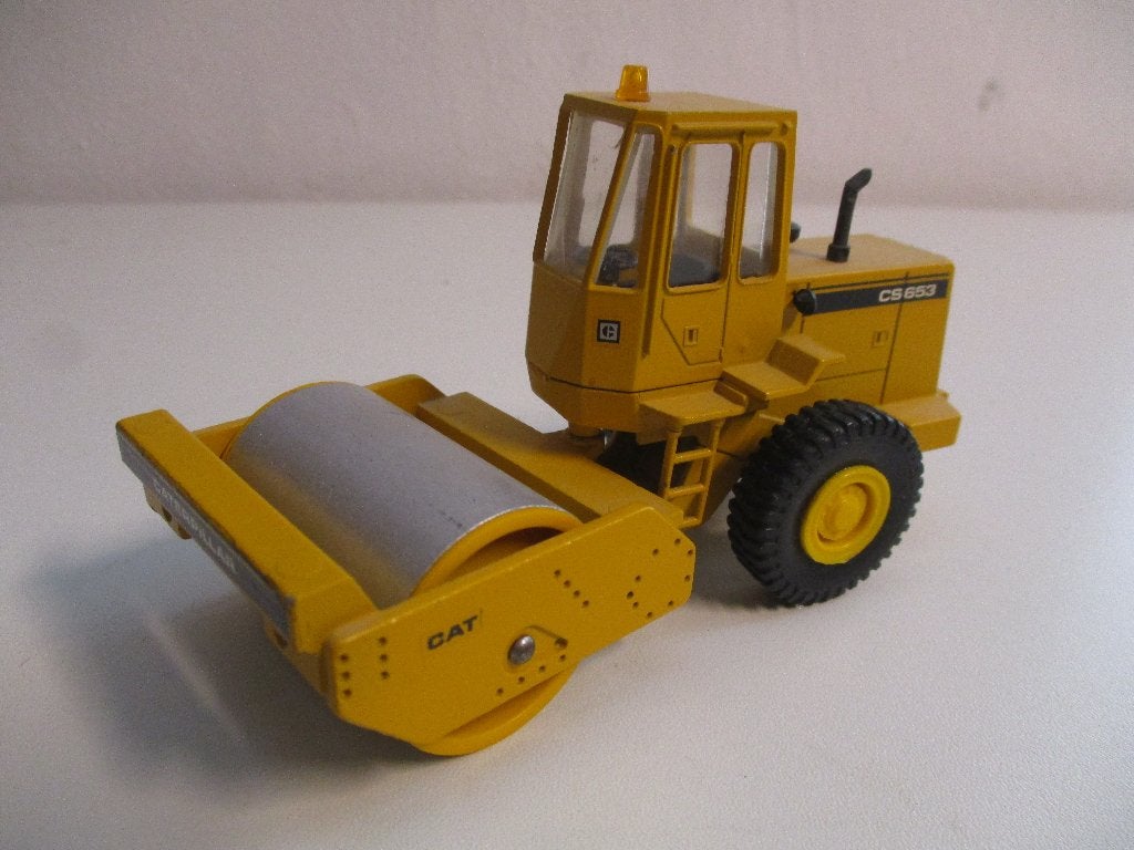 Conrad Caterpillar CS653 wals, Hobby en Vrije tijd, Modelauto's | 1:50, Ophalen of Verzenden, Gebruikt, Hijskraan, Tractor of Landbouw