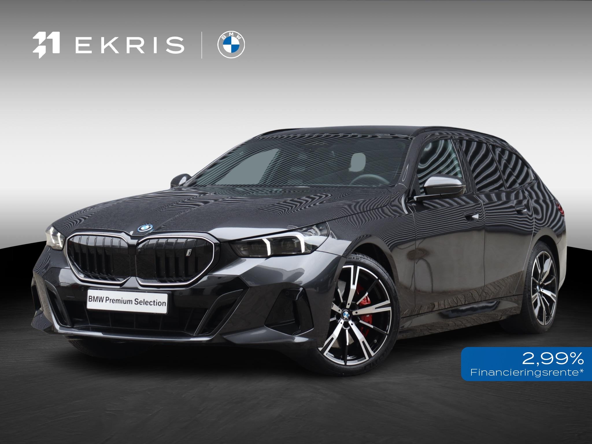 BMW i5 Touring eDrive40 | M Sportpakket Pro | Trekhaak | Pan, Auto's, Automaat, 510 min, Zwart, Met garantie (alle)