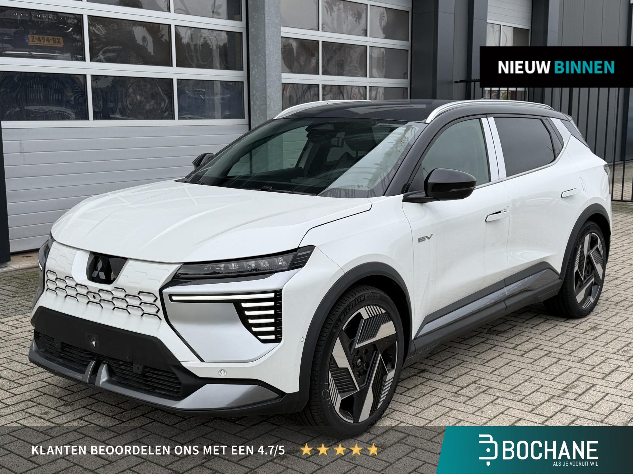 Mitsubishi Eclipse Cross Intense+ 87 kWh | Van: € 48.529,-, Auto's, Eclipse Cross, Met garantie (alle), Leder en Stof, Wit