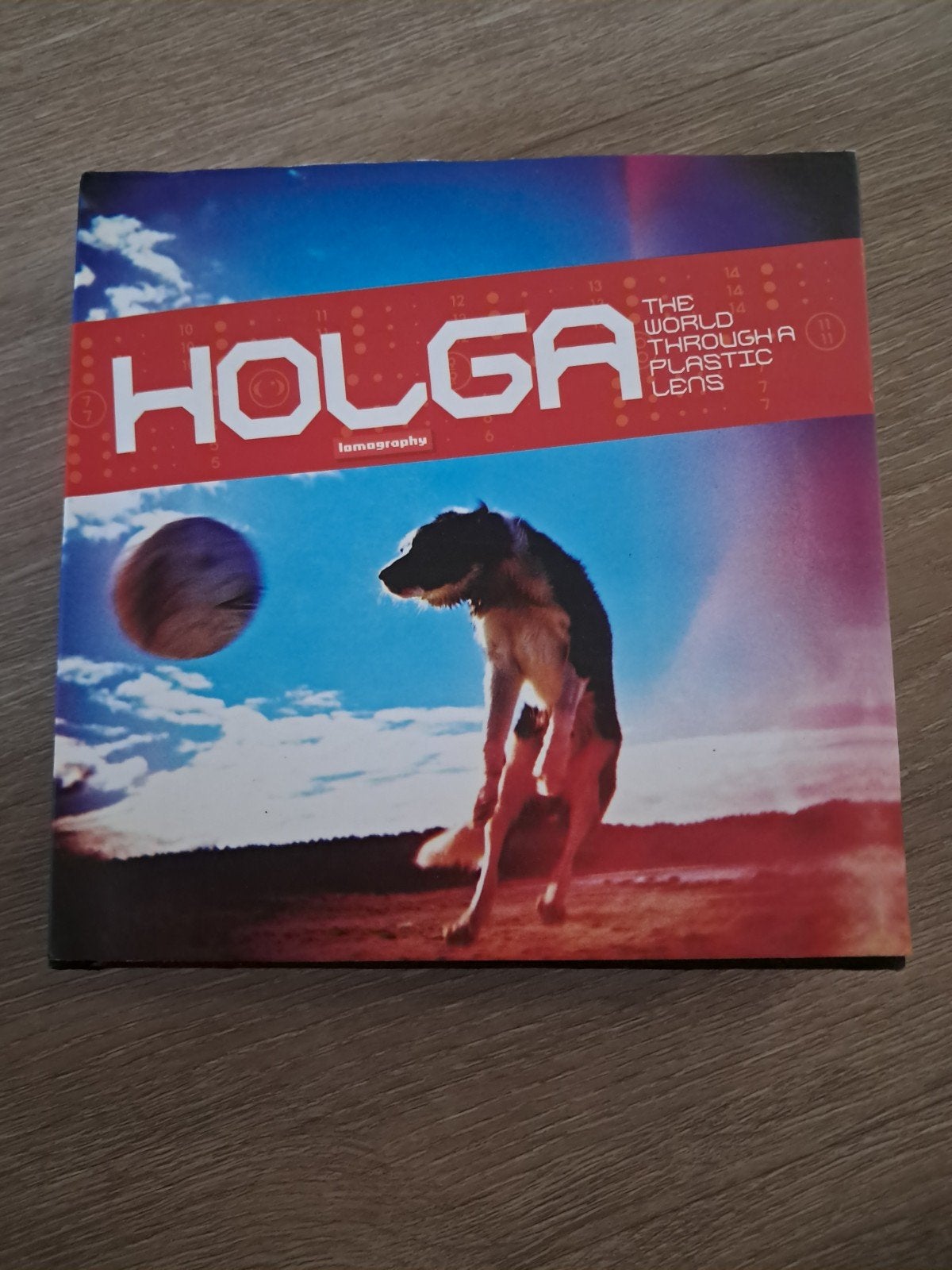 X: Holga: The World Through a Plastic Lens - Lomography Boek, Verzenden, Zo goed als nieuw, Fotografie algemeen, Lomography