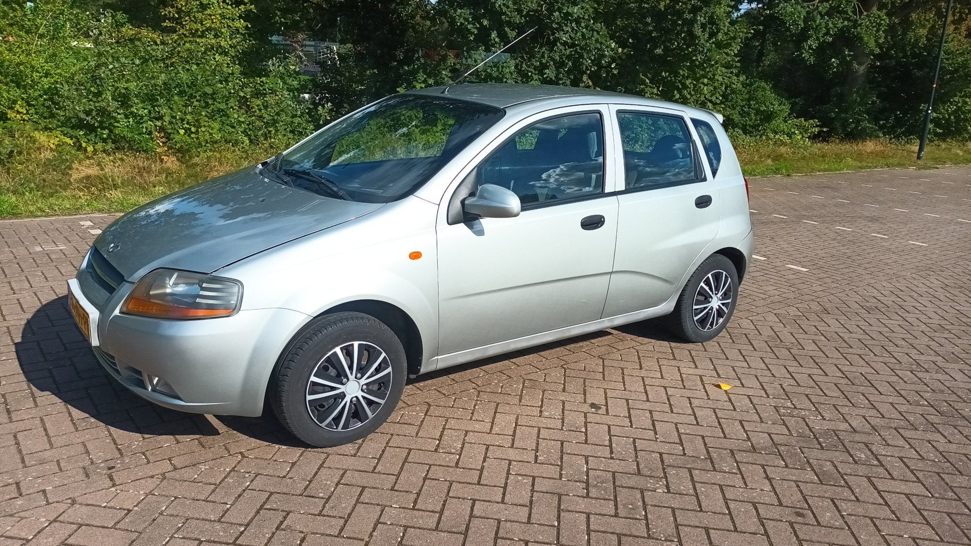Daewoo Kalos 1.4-16V Automaat / Nieuwe apk, Auto's, 94 pk, Stof, Verwarmde buitenspiegels, 4 cilinders
