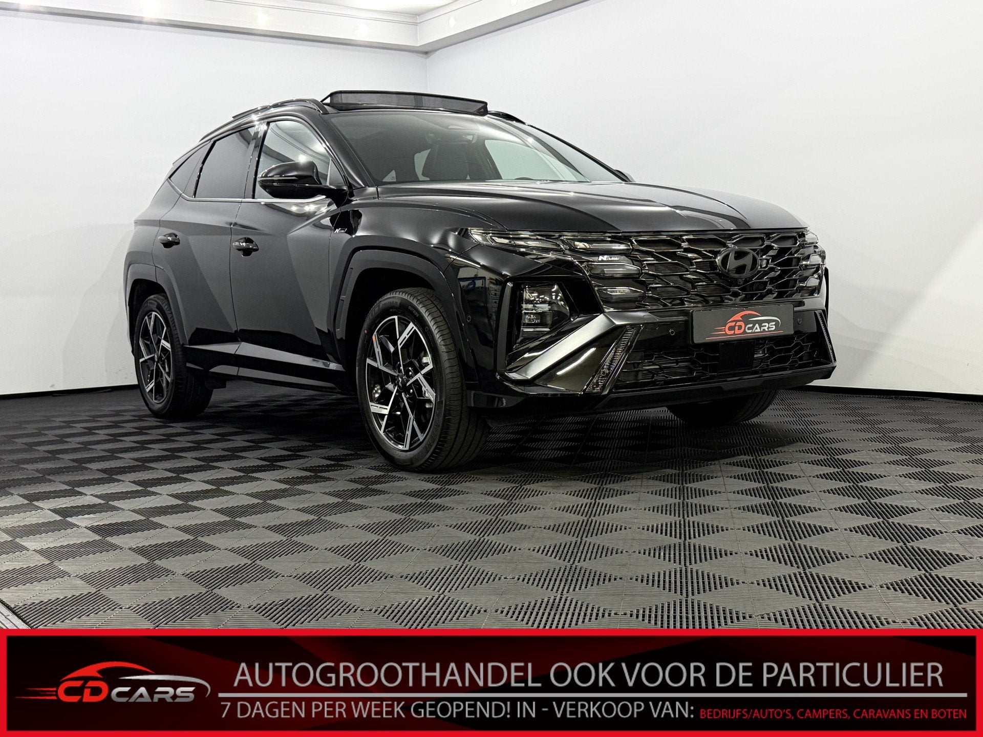 Hyundai Tucson 1.6 T-GDI PHEV N Line Sky 4 AWD Plug-in Pano,, Gebruikt, 4 cilinders, Leder en Stof, Zwart