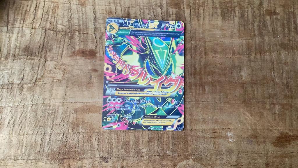 M rayquaza ex is beschadigd, Ophalen of Verzenden