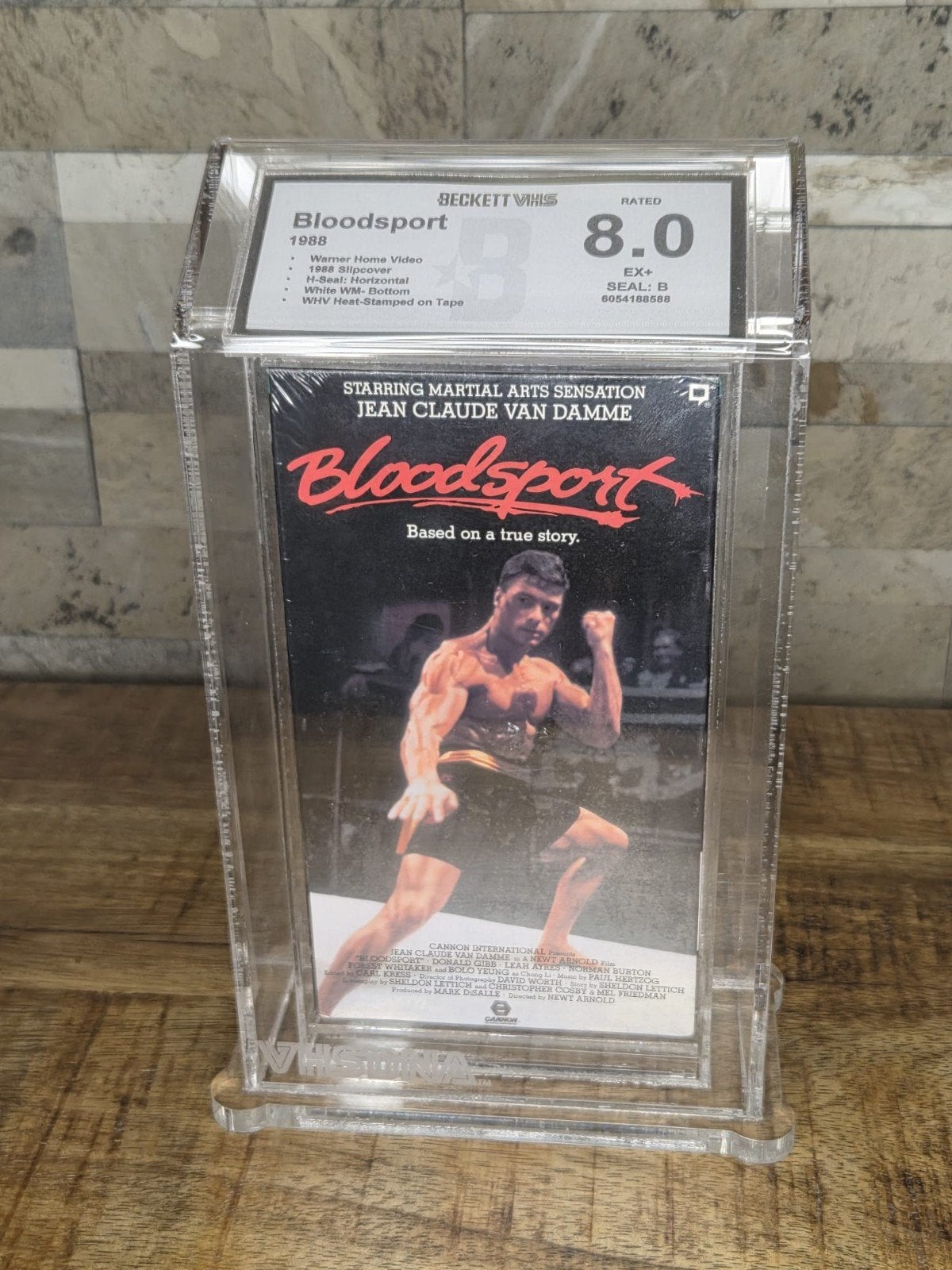 Bloodsport VHS Beckett DNA Graded 8.0  Jean-Claude Van Damme, Ophalen of Verzenden, Zo goed als nieuw, Actie en Avontuur, VHS