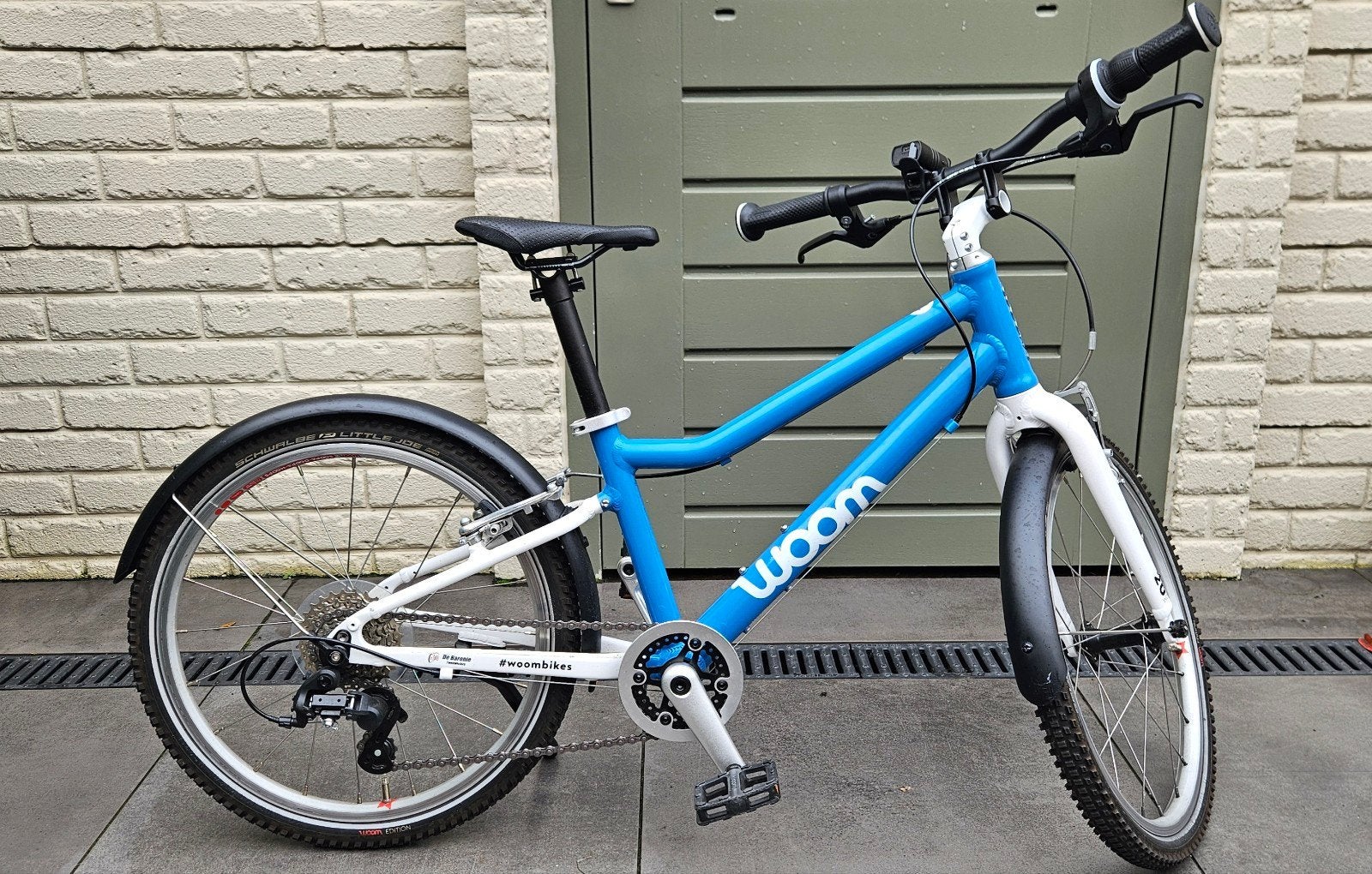 Woom kinderfiets blauw - Zo goed als nieuw, Ophalen, 20 inch of meer, Velgrem, Zo goed als nieuw