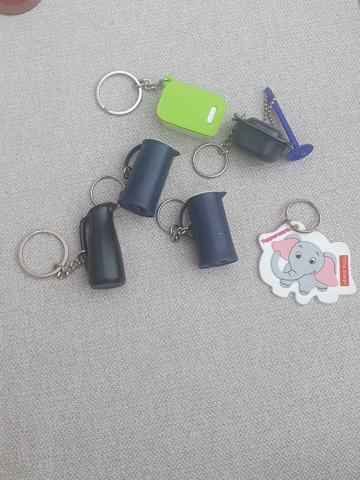 Te koop Tupperware sleutelhangers, Ophalen of Verzenden