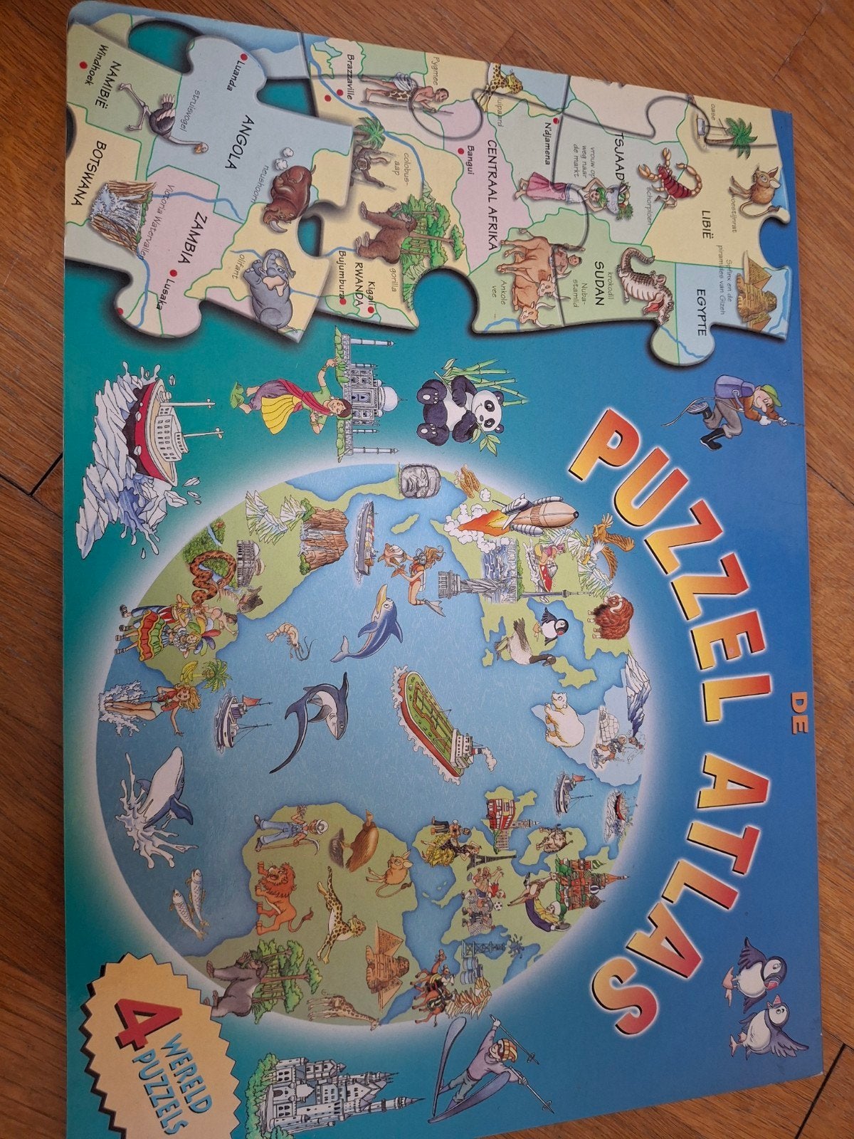 Puzzel Atlas - 4 Wereld Puzzels, Kinderen en Baby's, Ophalen of Verzenden, Meer dan 50 stukjes, Gebruikt, 6 jaar of ouder