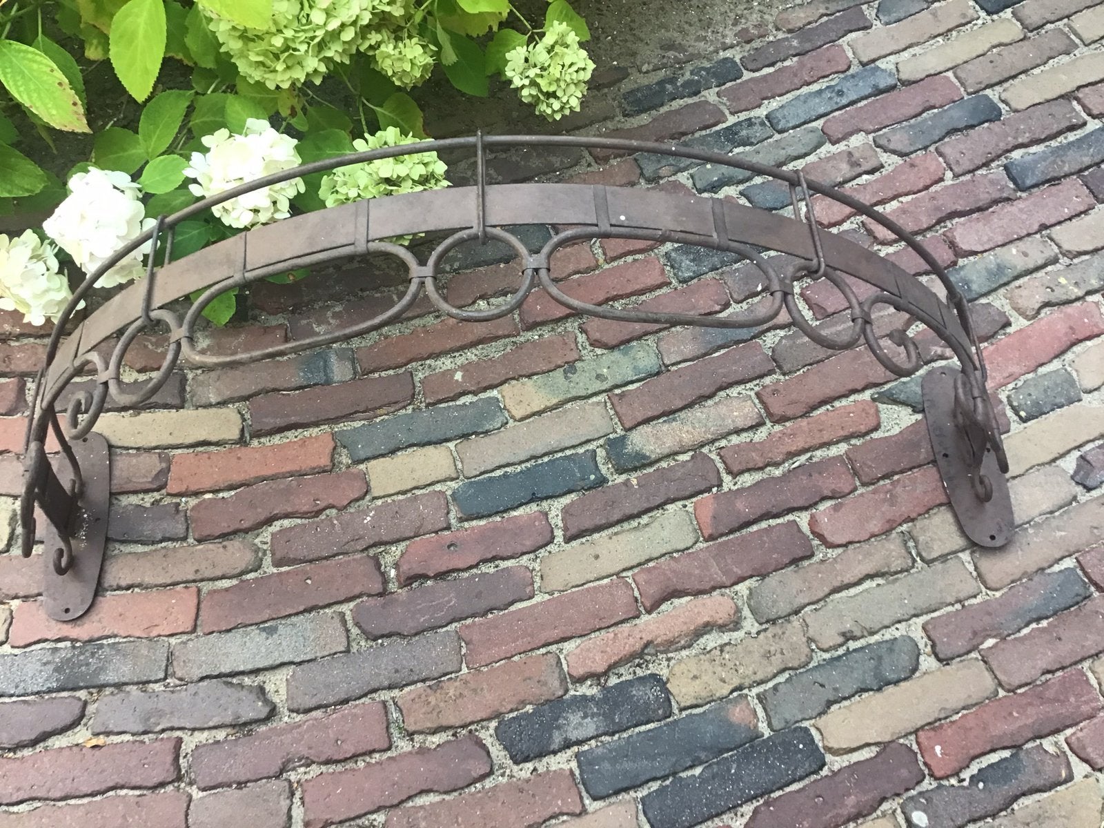 Brocante gietijzeren bedhemel, Ophalen