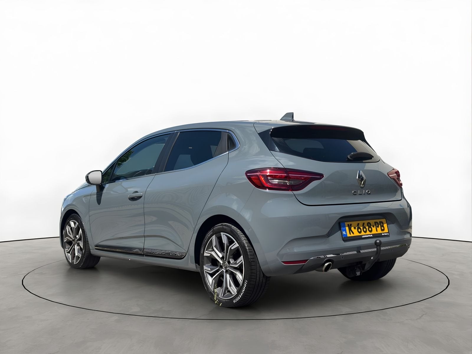 Renault Clio 1.0 TCe 100PK Automaat Intens Camera Trekhaak A, Auto's, Voorwielaandrijving, 101 pk, Gebruikt, Leder en Stof