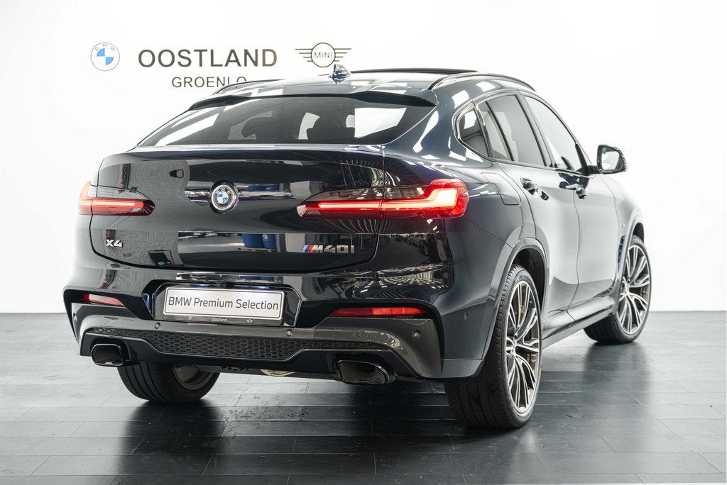 BMW X4 M40i Automaat / Trekhaak / Panoramadak /Keyless Entry, Auto's, BMW, Gebruikt, Euro 6, Met garantie (alle), Zwart