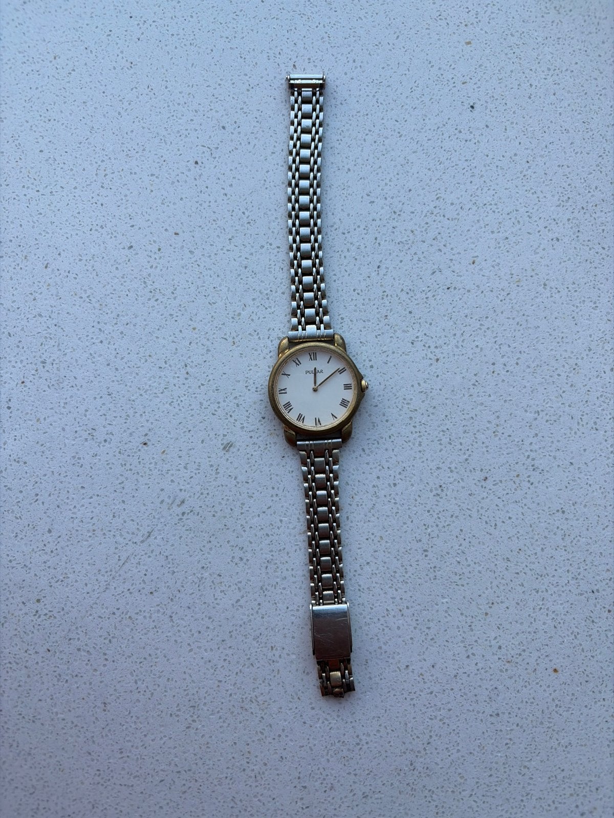 Pulsar dameshorloge met gouden kast en stalen band, Sieraden, Tassen en Uiterlijk, Overige merken, Staal, Gebruikt, Polshorloge