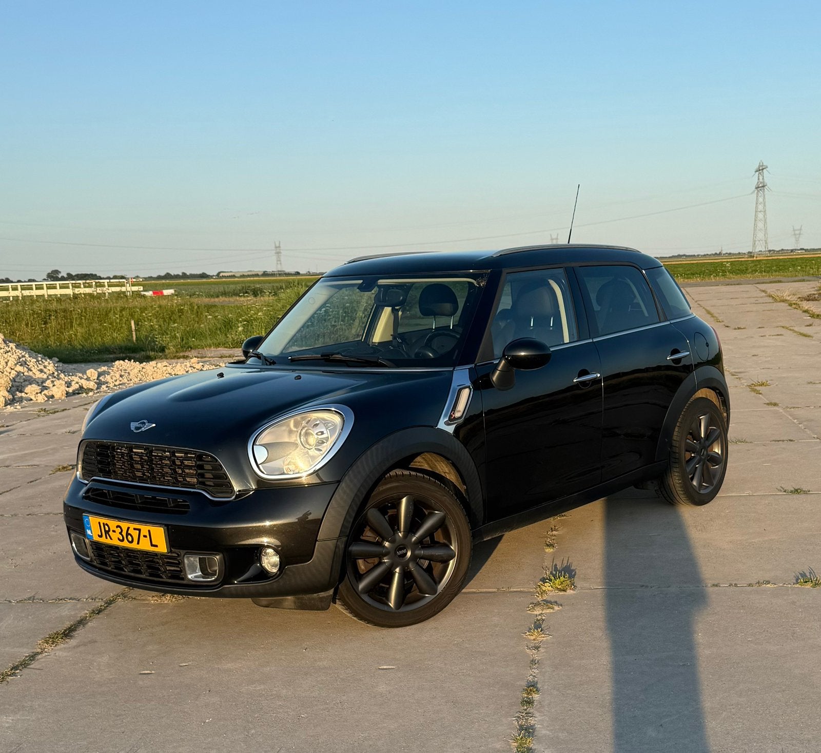 Mini Countryman 1.6 Cooper S All4 AUT 2010 Zwart, Auto's, 1380 kg, Zwart, Zwart, Leder