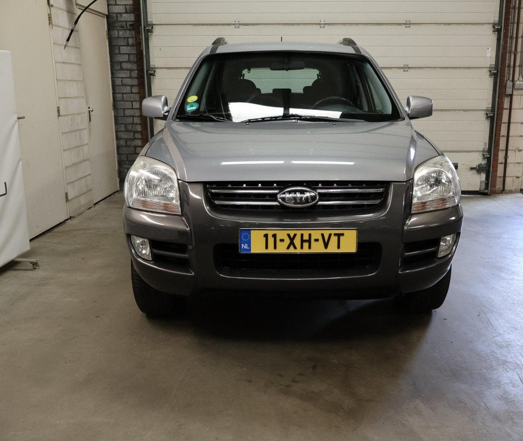 Kia Sportage 2.0 CVVT Comfort NAP Trekhaak Airco Cruise APK, Auto's, Kia, 1442 kg, Stof, Gebruikt, 4 cilinders