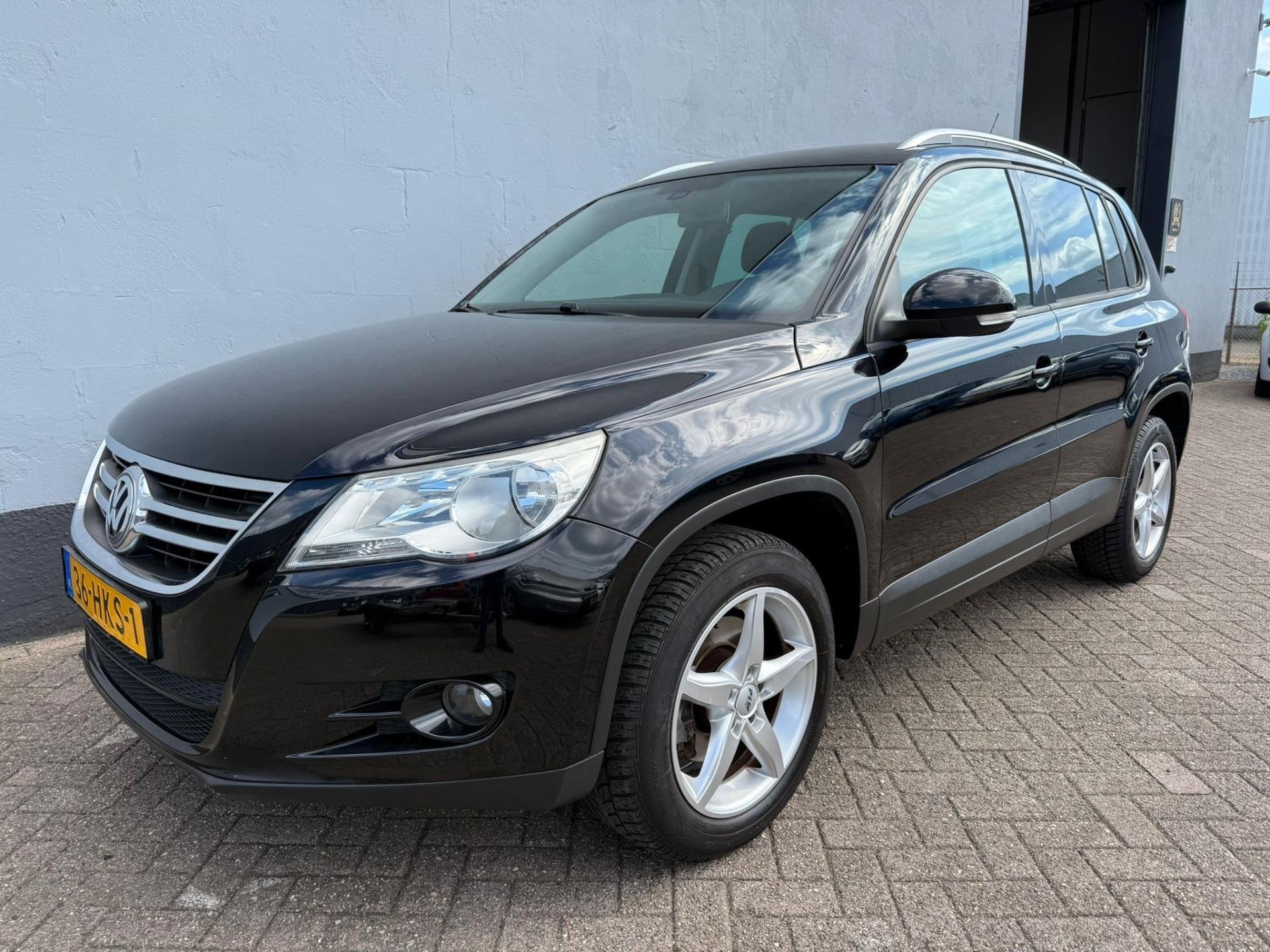 Volkswagen Tiguan 1.4 TSI Sport&Style - Trekhaak - Cruise, Euro 5, 4 cilinders, 150 pk, Zwart