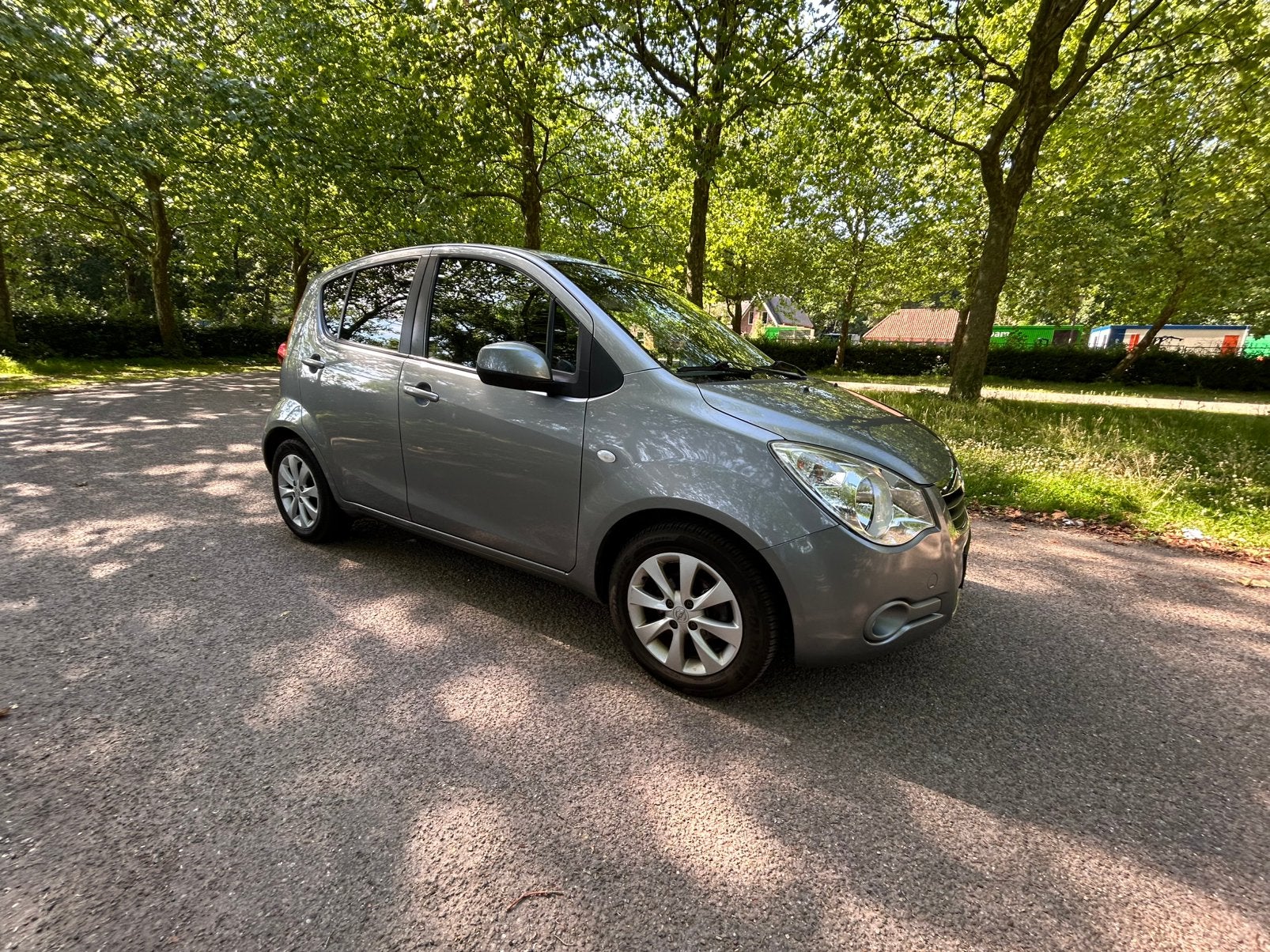 Opel Agila 1.0 12V 2015 Grijs, Auto's, Voorwielaandrijving, 31 €/maand, Origineel Nederlands, Handgeschakeld