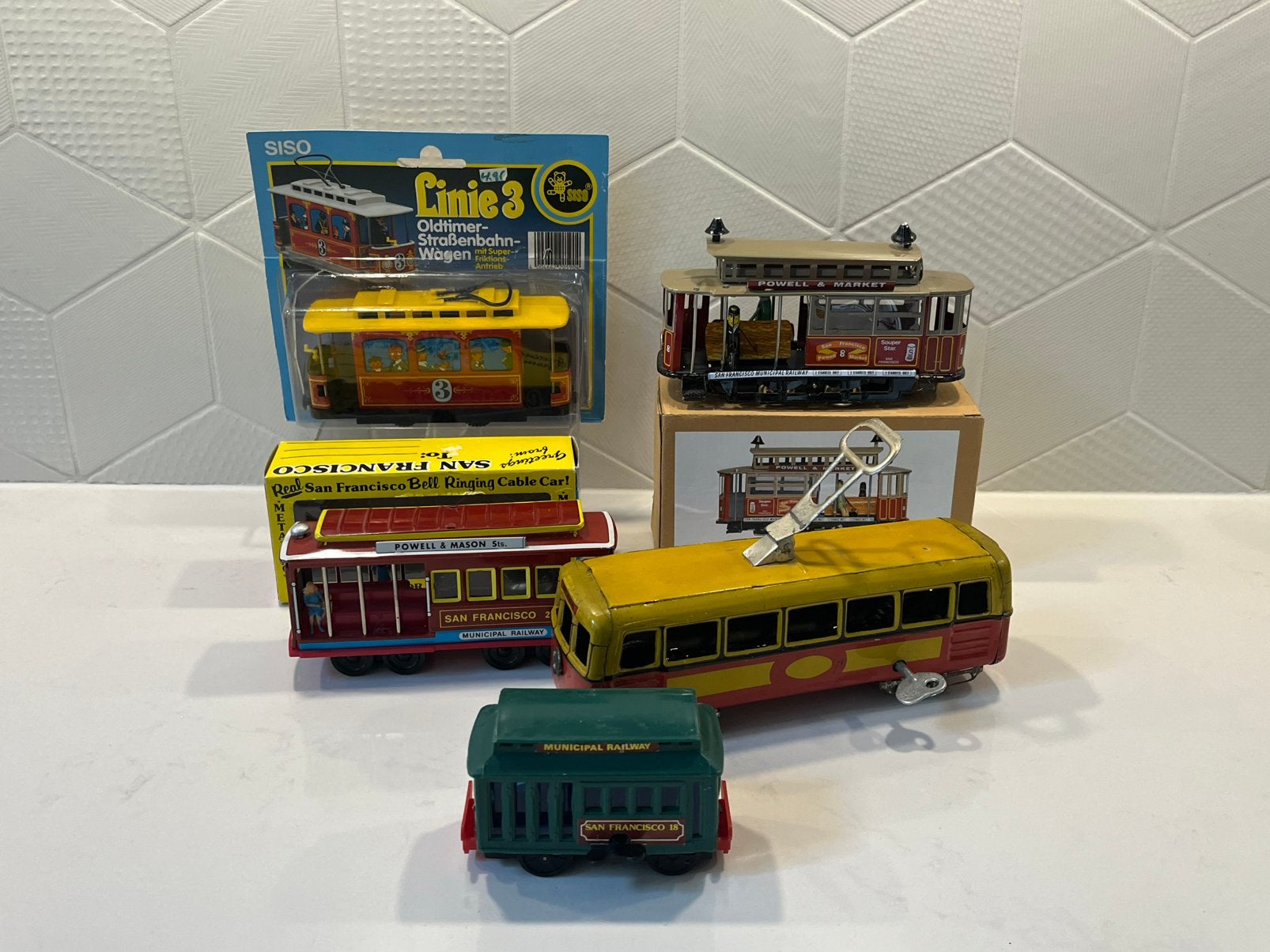 5 vintage blikken speelgoed trams San Francisco kabeltram, Verzenden